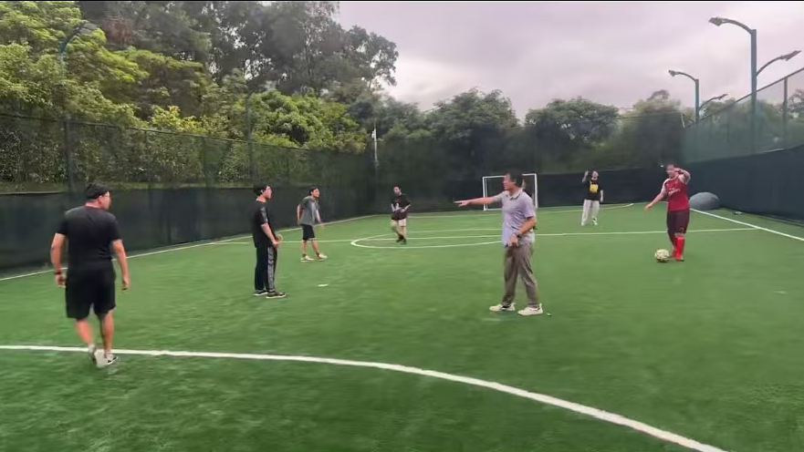 Freedom AI football on a rainy court
